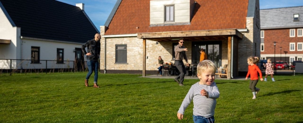 Family enjoying a holiday home stay supported by smarter booking and planning tools.